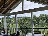 <b>This screened in porch allows the homeowner to enjoy the great outdoors without the irritation of the bugs outside</b>
